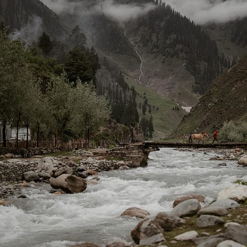 scenic river crossing in kashmir valley