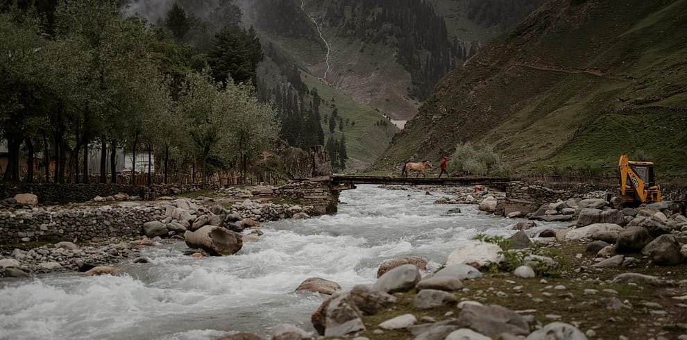scenic river crossing in kashmir valley